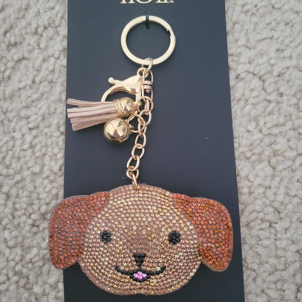 nOir Brown Dog Keychain with Gold Details